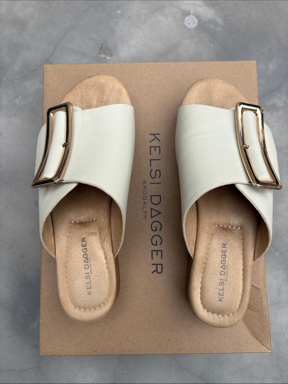 Kelsi Dagger Ivory Slide Mules with Gold Buckle